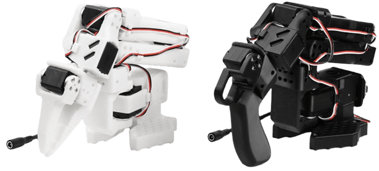 The LeRobot SO-101 Arms. The white arm on the left the follower and the black arm on the right is the leader.